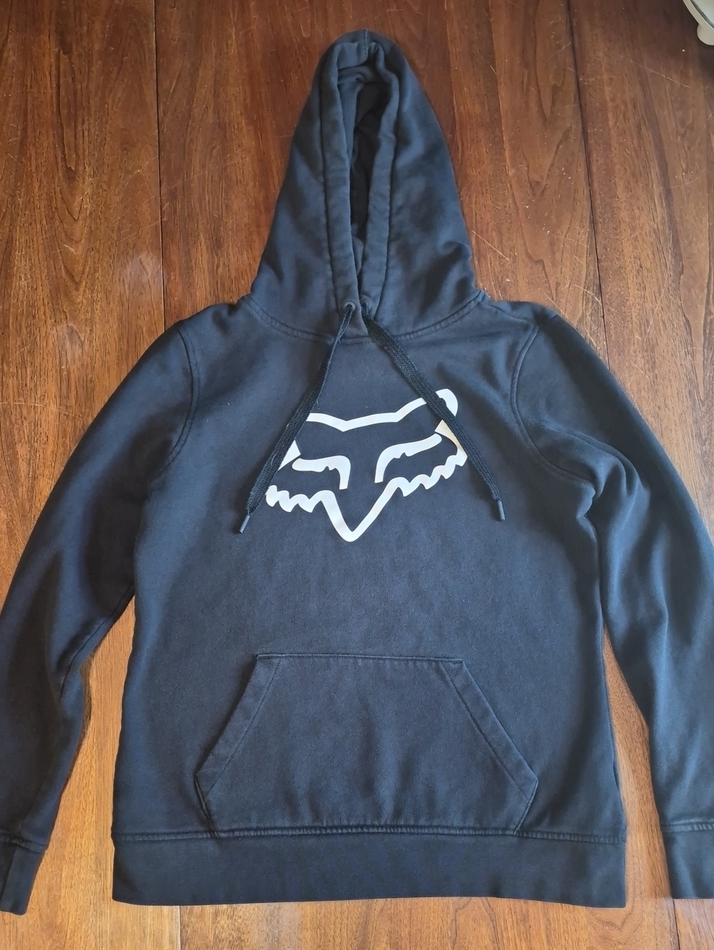 Very cute hoodie, only worn a Few times. Small hole on the back See Picture.